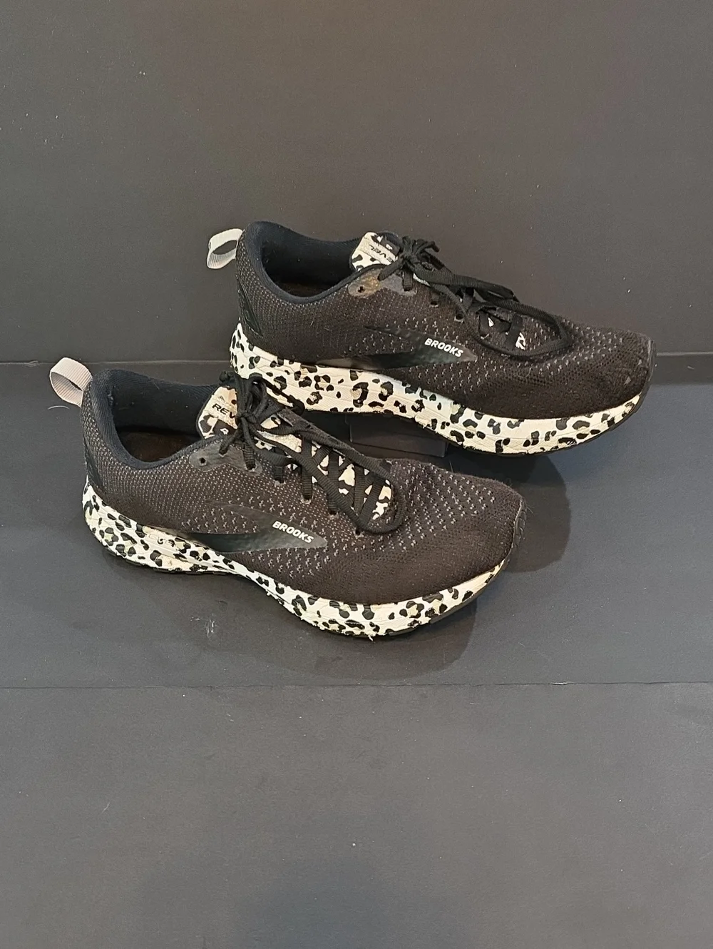 Brooks Revel 4 Women's Black Knit Shoes with Leopard-Print Midsole Size 8.5